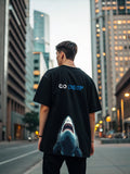 Black oversized T-shirt featuring a vibrant print of Naruto Uzumaki in his classic pose, made from 100% combed cotton for a comfortable unisex fit.
